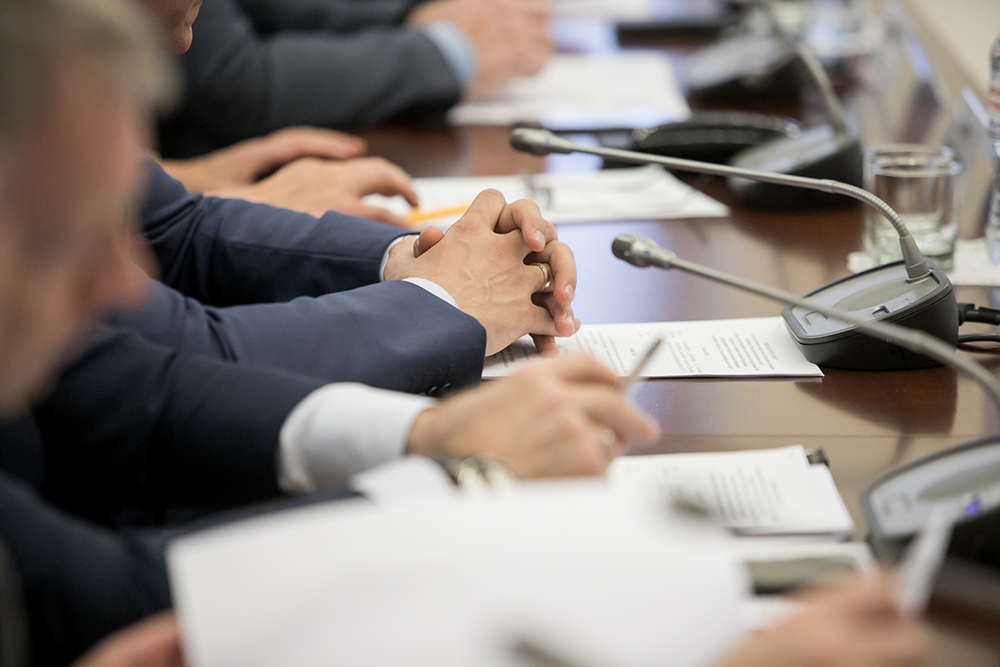 Photo of people participating in a public hearing